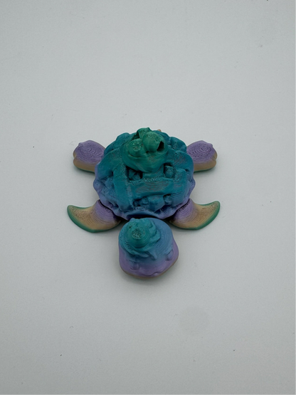 Whimsical blueberry pie turtle desk toy crafted from 100% recycled plastic.