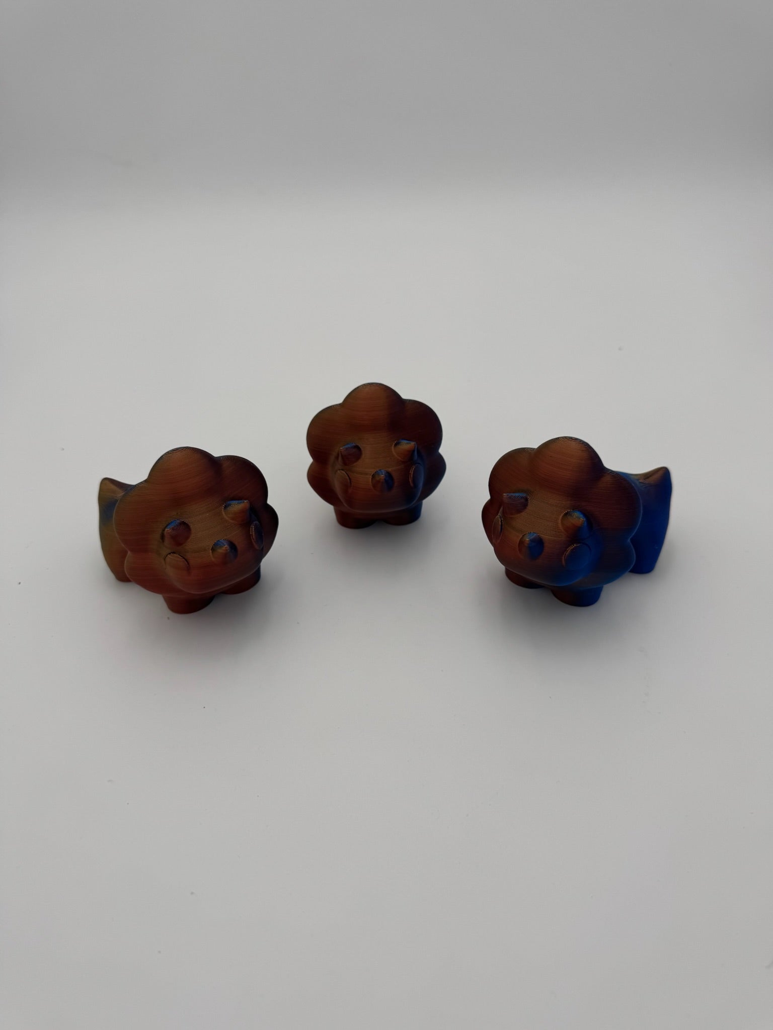 Hand-sized Tri Dino Mega Mini articulated dinosaur fidget toy.
