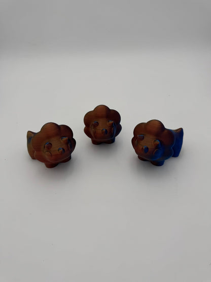 Hand-sized Tri Dino Mega Mini articulated dinosaur fidget toy.