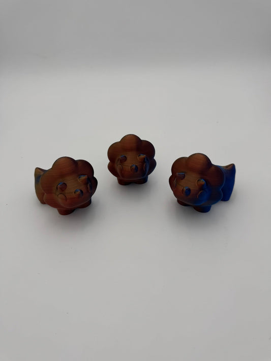 Hand-sized Tri Dino Mega Mini articulated dinosaur fidget toy.