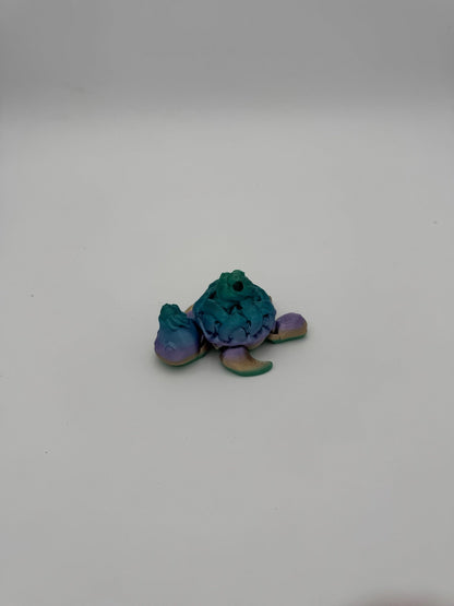 3D printed dessert-themed turtle collectible showcasing smooth joint articulation.