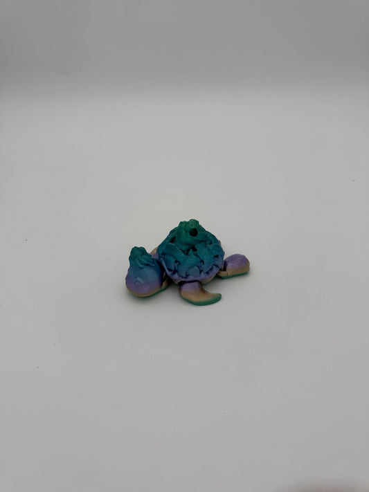 3D printed dessert-themed turtle collectible showcasing smooth joint articulation.