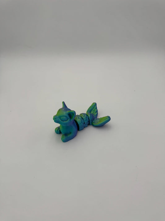 3D printed mythical cat mermaid model showcasing smooth tail articulation.