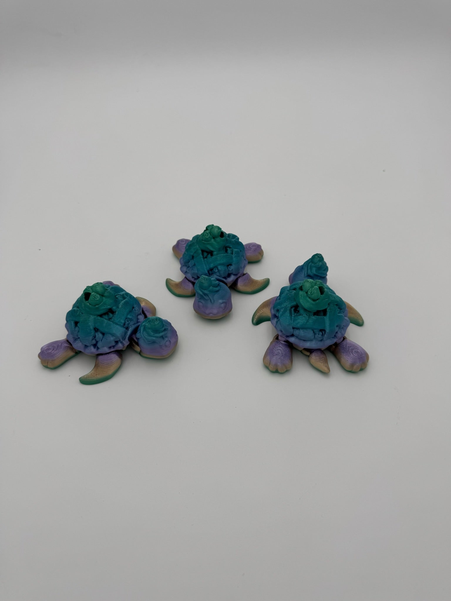 Hand-sized Blueberry Pie Turtle Mega Mini articulated fidget toy.