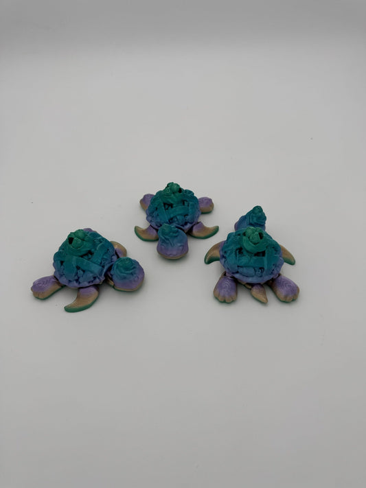 Hand-sized Blueberry Pie Turtle Mega Mini articulated fidget toy.